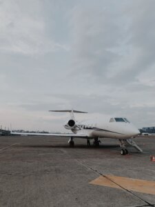 Private-jet-charter-aircraft-parked-on-the-airport-ramp-scaled.jpg