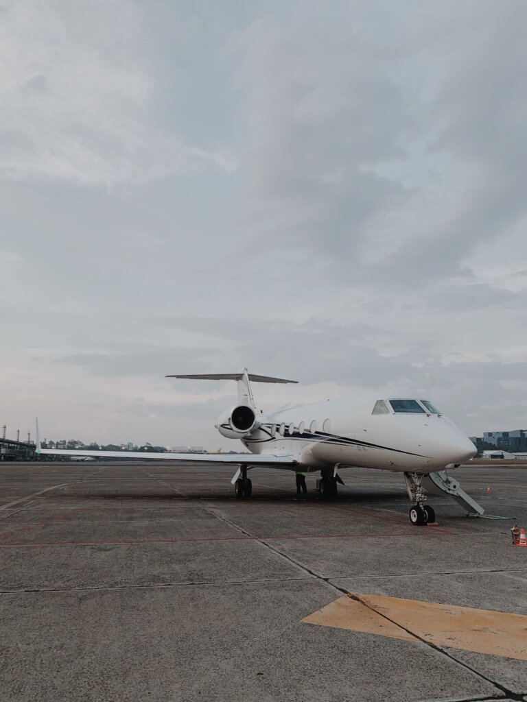 Private-jet-charter-aircraft-parked-on-the-airport-ramp-scaled.jpg