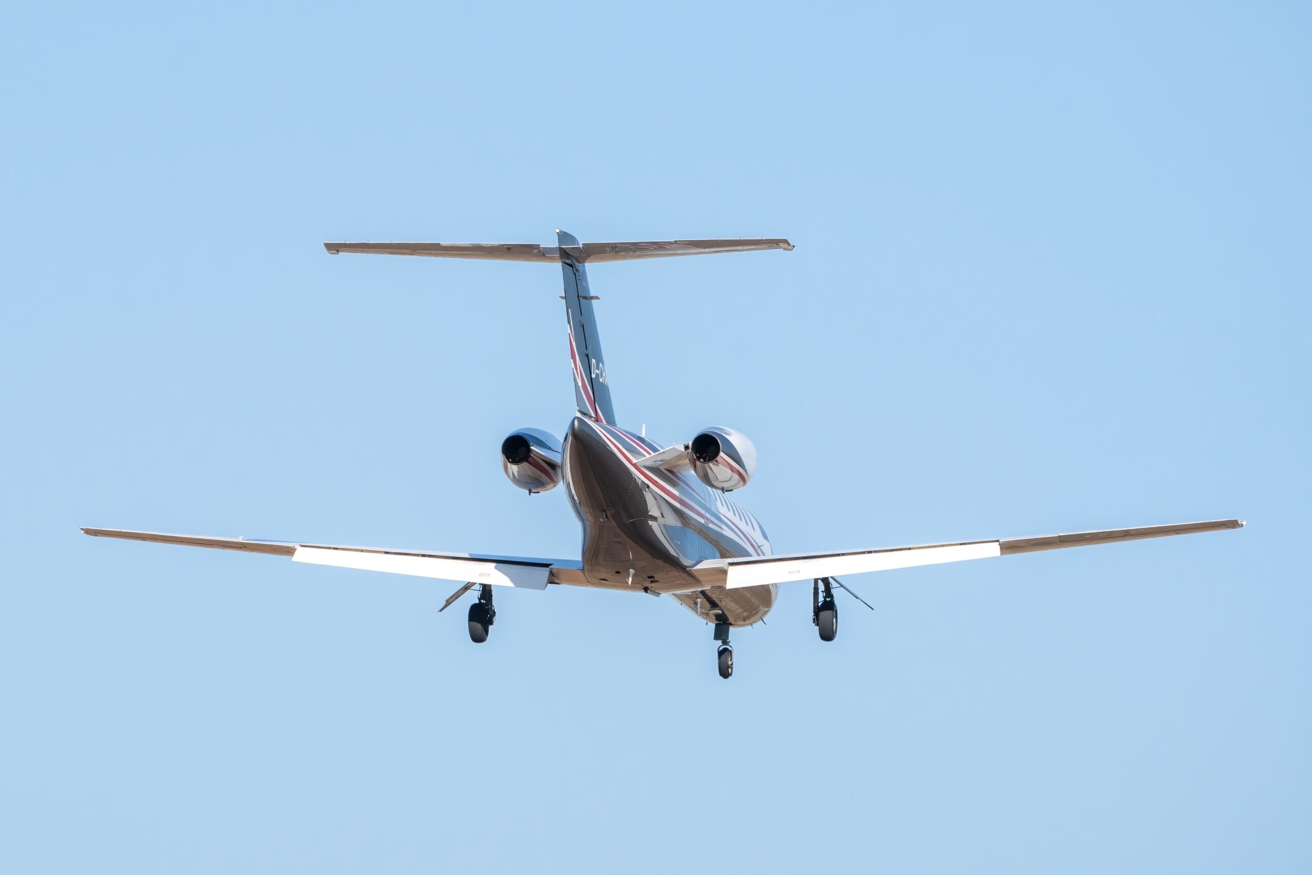 Private-jet-flying-through-blue-skies-on-a-Dallas-to-Atlanta-charter-route-scaled.jpg