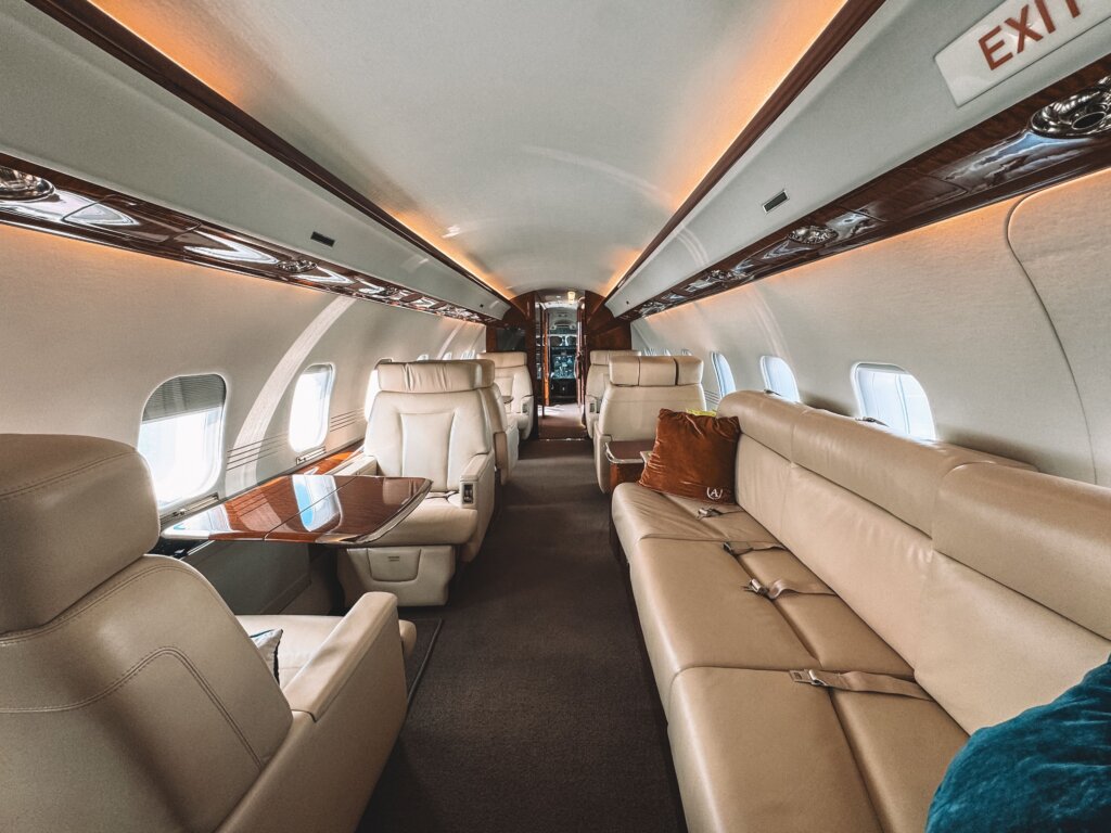 Luxury-private-jet-cabin-interior-with-leather-seating-and-spacious-layout-for-a-Chicago-to-Austin-charter-flight-scaled.jpg