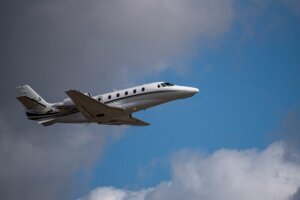 Private jet airborne in flight for a Washington DC to Boston charter trip