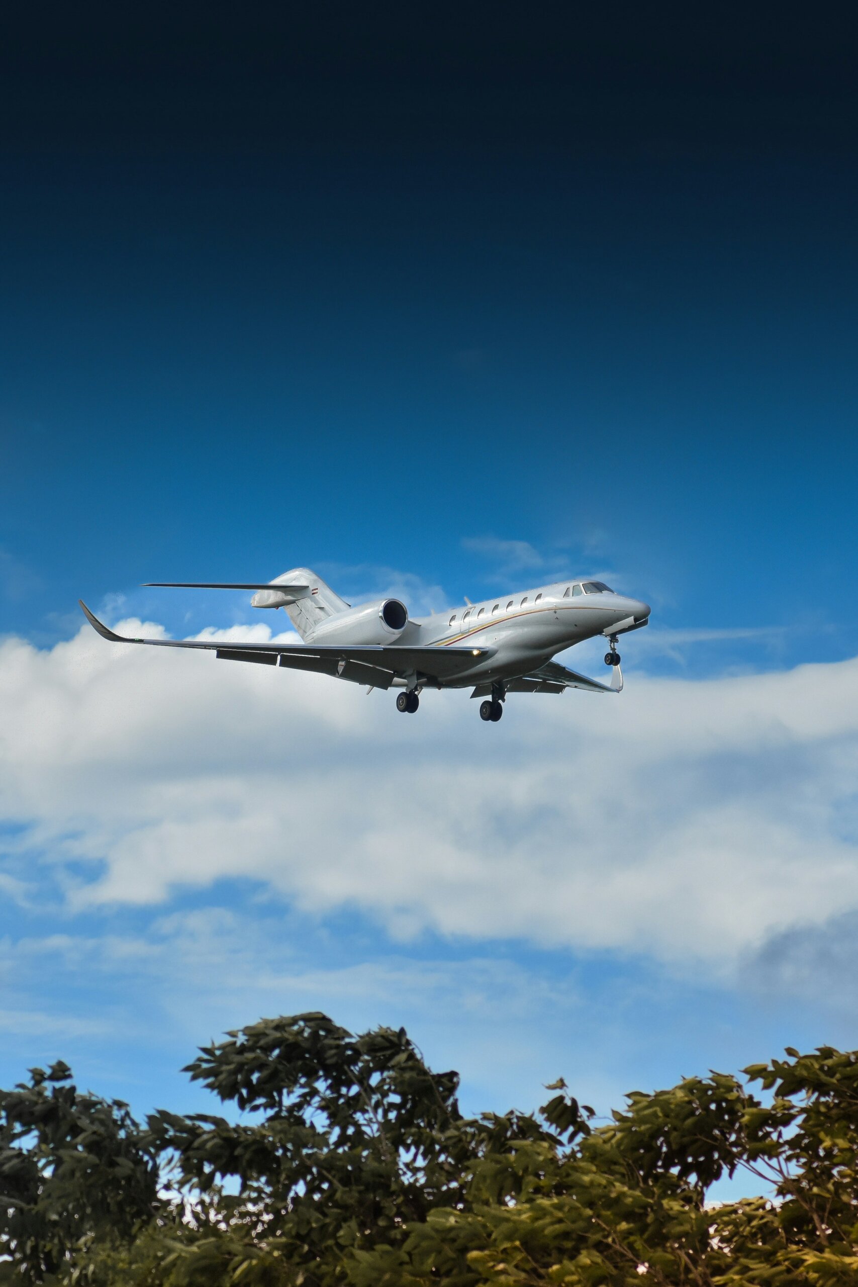 Private jet landing at McClellan-Palomar Airport in Carlsbad, California