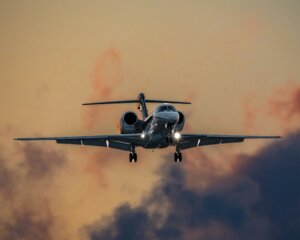 Private jet landing at an airport for an Orlando to Charleston charter flight